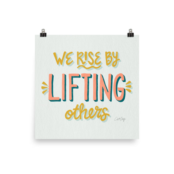 We Rise by Lifting Others - Marigold Blush
