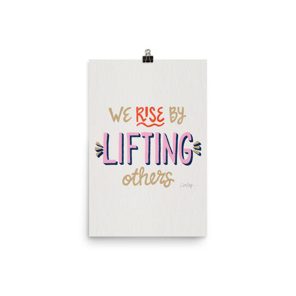 We Rise by Lifting Others - Coral Pink