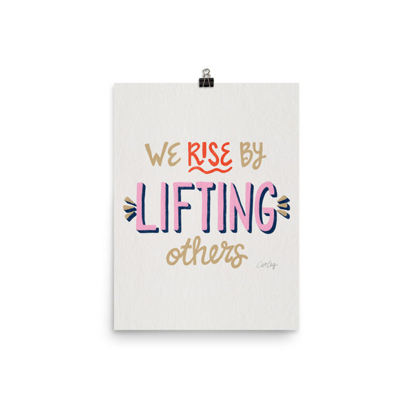 We Rise by Lifting Others - Coral Pink