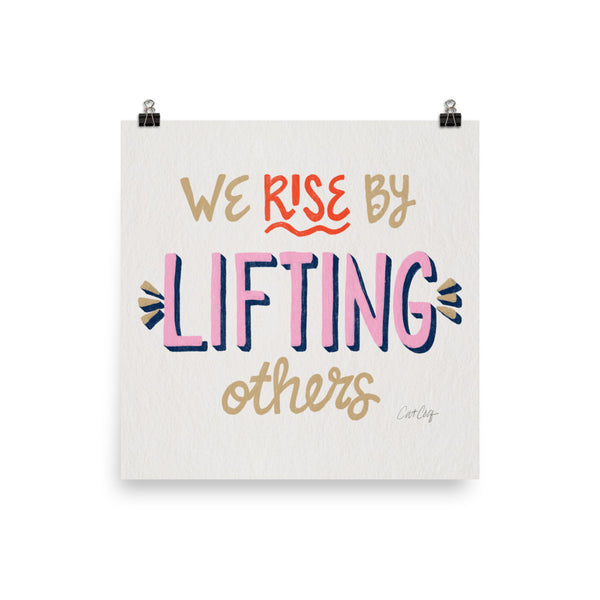 We Rise by Lifting Others - Coral Pink